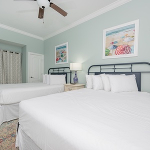 Relax on one of the cozy queen beds in this guest suite and enjoy a peaceful slumber