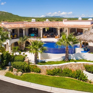 Indoor/outdoor living with pool and palapa