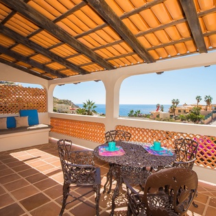 Cozy covered terrace with seating