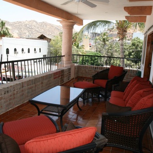 Watch the nightlife from a private patio