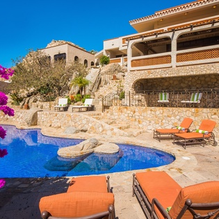 Outdoor seating by the pool