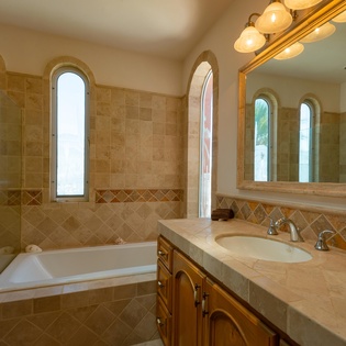 Full bathroom with bathtub and shower