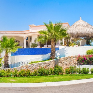 Street view of villa with infinity pool-11