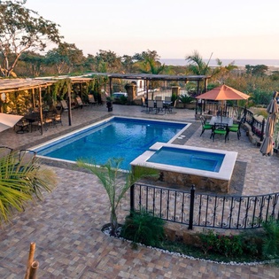 Large pool and Jacuzzi patio