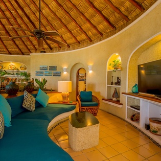 Spacious living room with TV