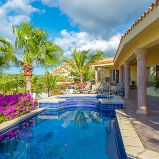 Patio with pool and ocean view