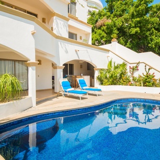 Poolside view of villa