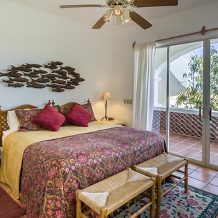 Bedroom suite with patio access