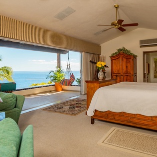 Bedroom suite with terrace access and view