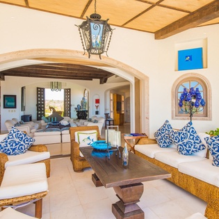 Well appointed living room and patio