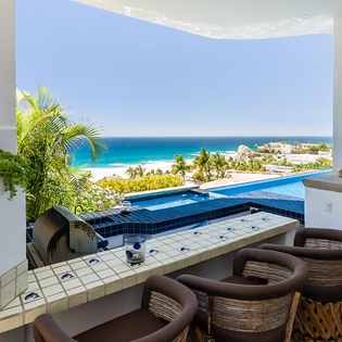 Outdoor bar seating with ocean views