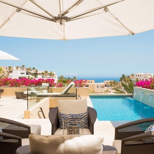Patio with pool and ocean view