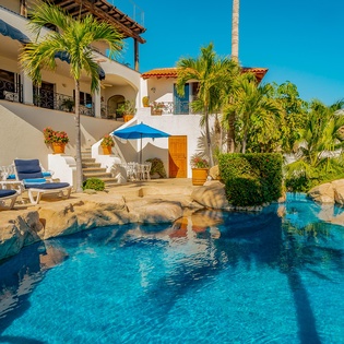 Patio with infinity edge pool