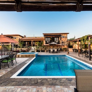 Large pool and jacuzzi patio
