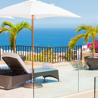 Sunny patio with lounge chairs