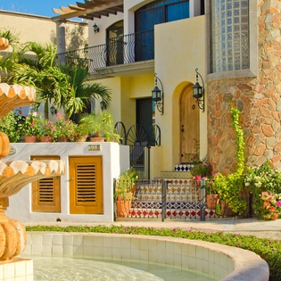 Exterior of villa with gorgeous fountain