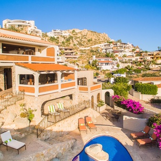 Side aerial view of pool and villa
