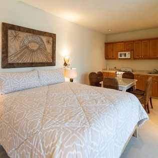 Casita suite with queen bed and kitchenette