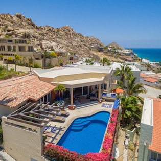 Aerial view of the pool and villa
