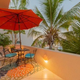Terrace with umbrella and table