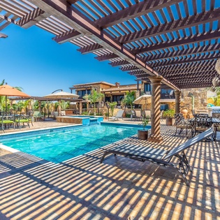 Large pool patio with loungers