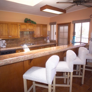 Large kitchen with bar seating