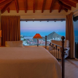 Bedroom suite with terrace access and view