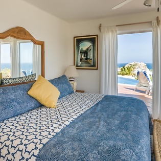 Bedroom suite with patio access