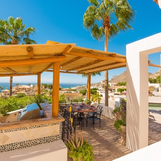 Covered outdoor dining and grill