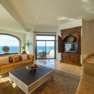 Living room with TV and ocean views
