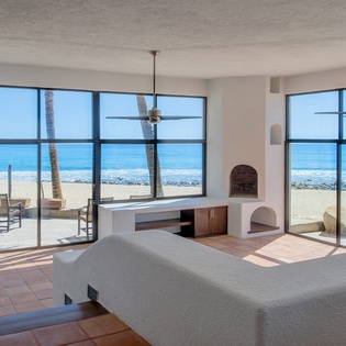 Living area with patio and beach access