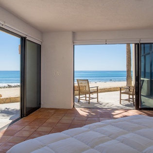 Bedroom suite with patio and beach access