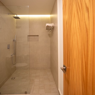En suite bathroom with walk in shower