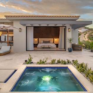 The property showcases a luxurious hillside setting with stunning natural landscape and modern architecture, perfect for your peaceful retreat.