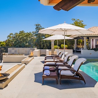 Lounge poolside under the sun