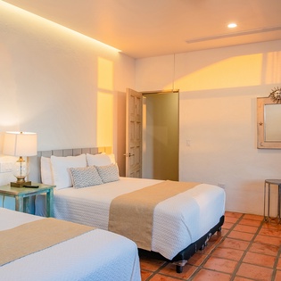 Bedroom suite with 2 queen beds