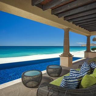Relax on your private terrace with stunning turquoise waters just steps away. Your infinity pool blends seamlessly with the endless ocean horizon.
