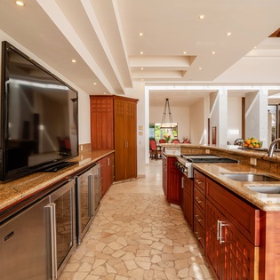 Fully equipped kitchen with TV