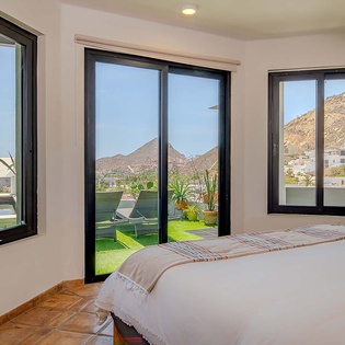 Wake up to stunning mountain views framing your private terrace. Three large windows flood your room with natural light and bring the outdoors in.