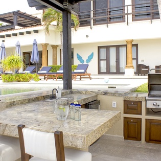Outdoor BBQ grill with bar seating