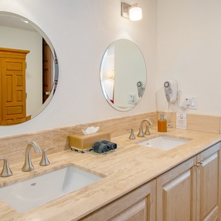 En suite bathroom with double sink