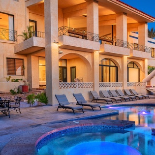 Poolside view of villa's exterior