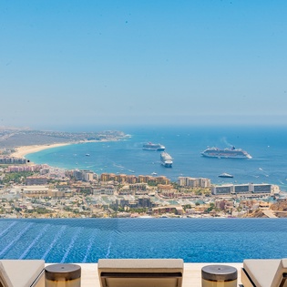 Poolside with jacuzzi and incredible views