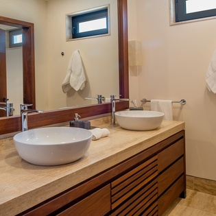 En suite bathroom with double sink