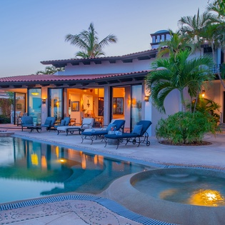 Poolside view of villa exterior
