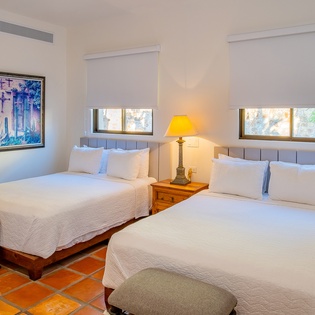 Bedroom suite with 2 queen beds