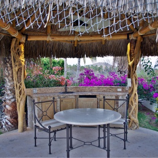 Outdoor seating under palapa