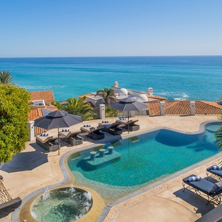 Poolside patio with jacuzzi and gorgeous ocean views