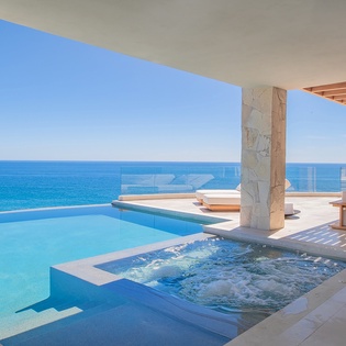 Poolside patio with ocean views