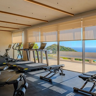 Your workout comes with stunning ocean views in this modern fitness center, where natural light streams in.